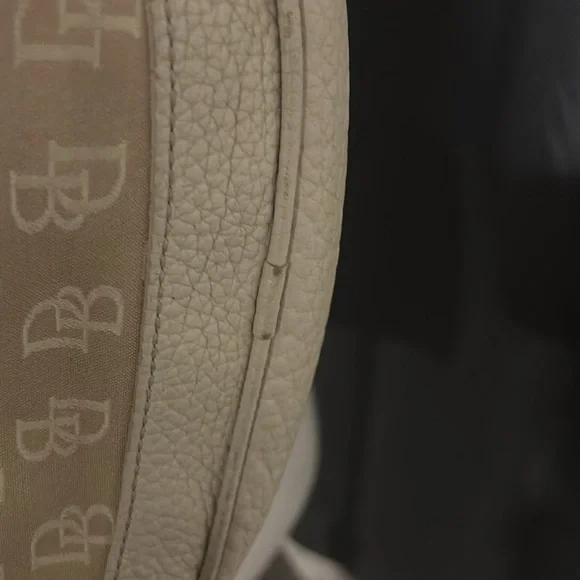 Dooney and Bourke vintage hobo purse in the color cream. - Picture 11 of 14